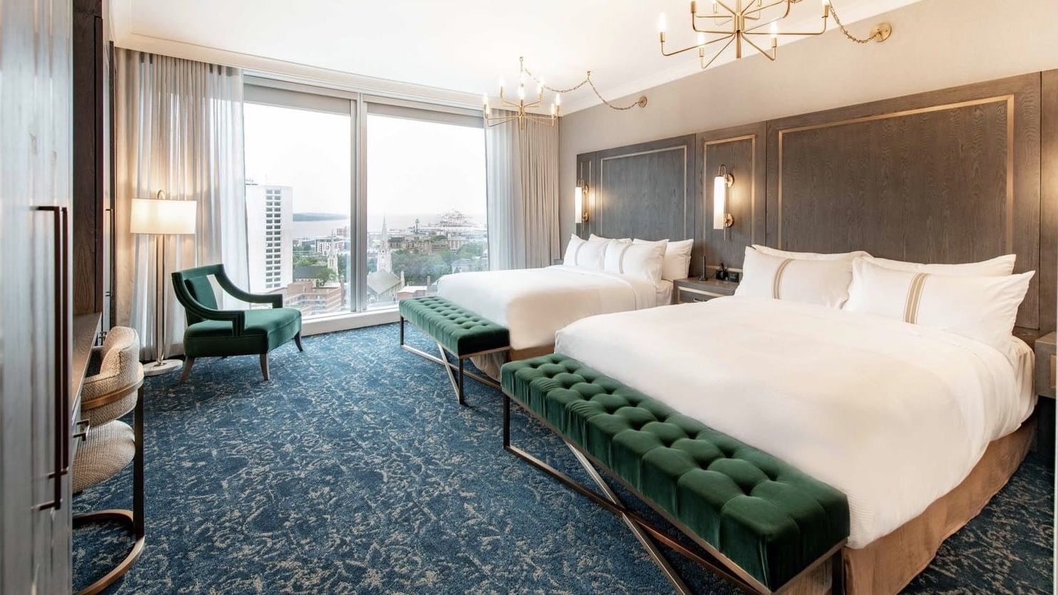 The Sutton Place Hotel bedroom with city view